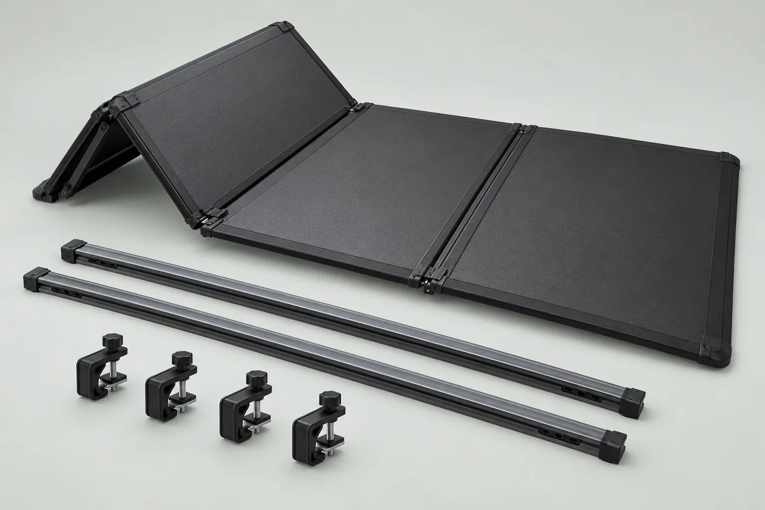 Hard folding tonneau cover, mounting rails and clamps